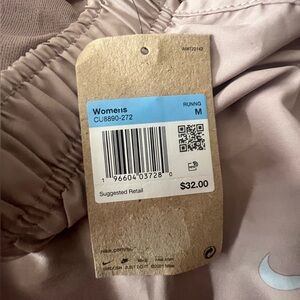 medium brown nike shorts with tag